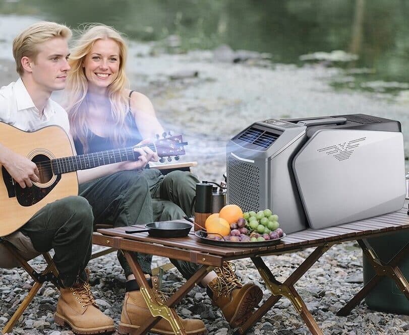 Portable outdoor climate unit beside a campsite table